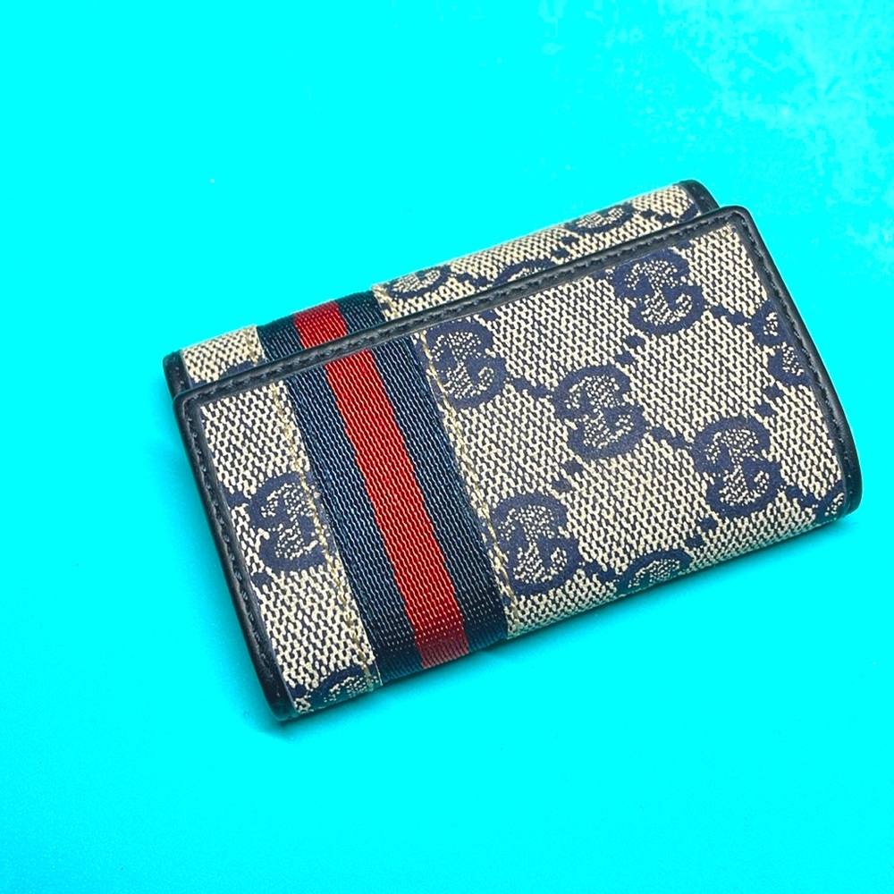 Gucci key pouch.